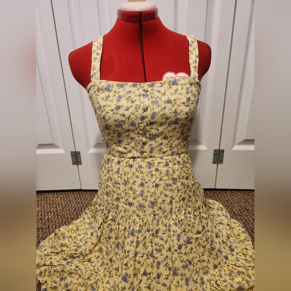Yellow dress with purple flowers. Size S.